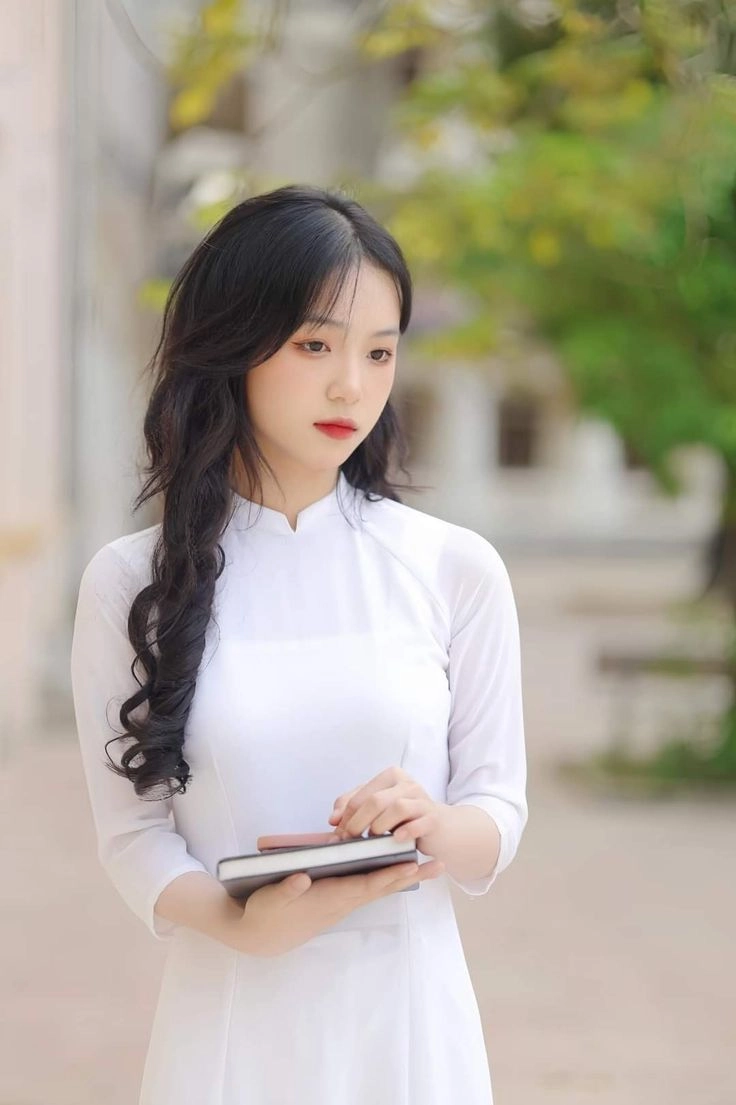 áo dài học sinh tay lửng đem lại cảm giác gọn nhẹ thoải mái
