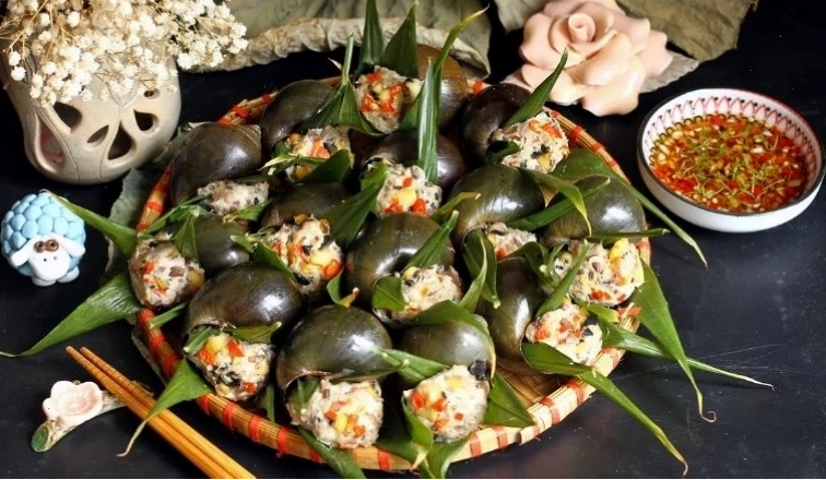 Ốc nhồi thịt hấp lá gừng mang đến hương vị thơm ngon hấp dẫn