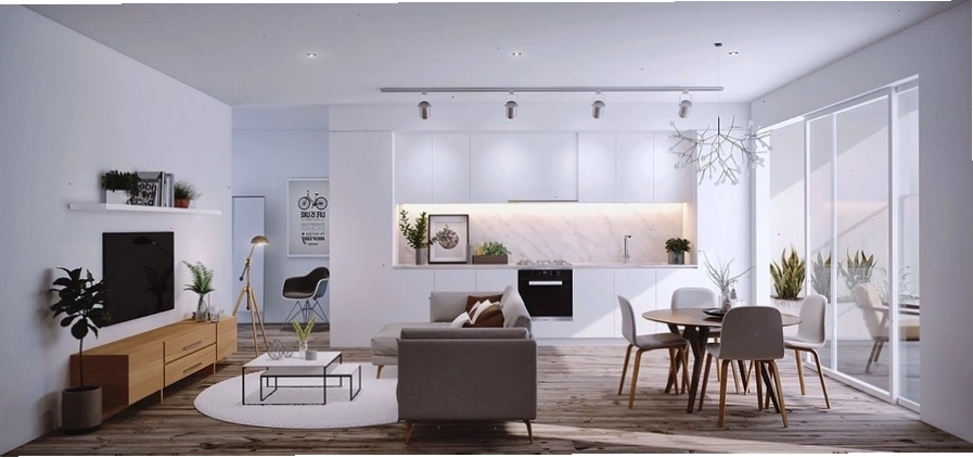 Phòng khách chung cư nhỏ được trang trí tối giản với sofa màu be và bàn trà gỗ